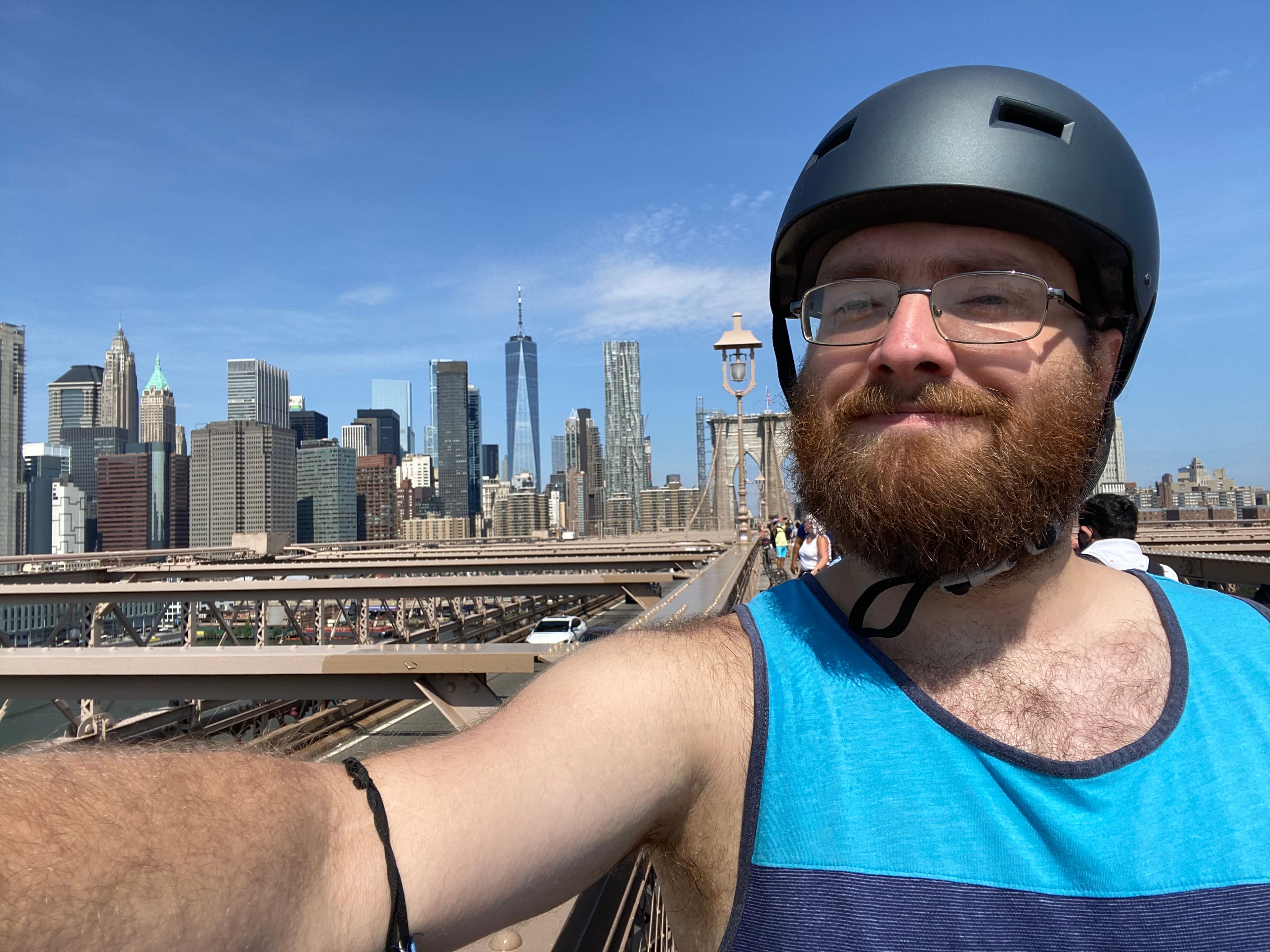 Selfie on the Brooklyn Bridge with Manhattan in the background 