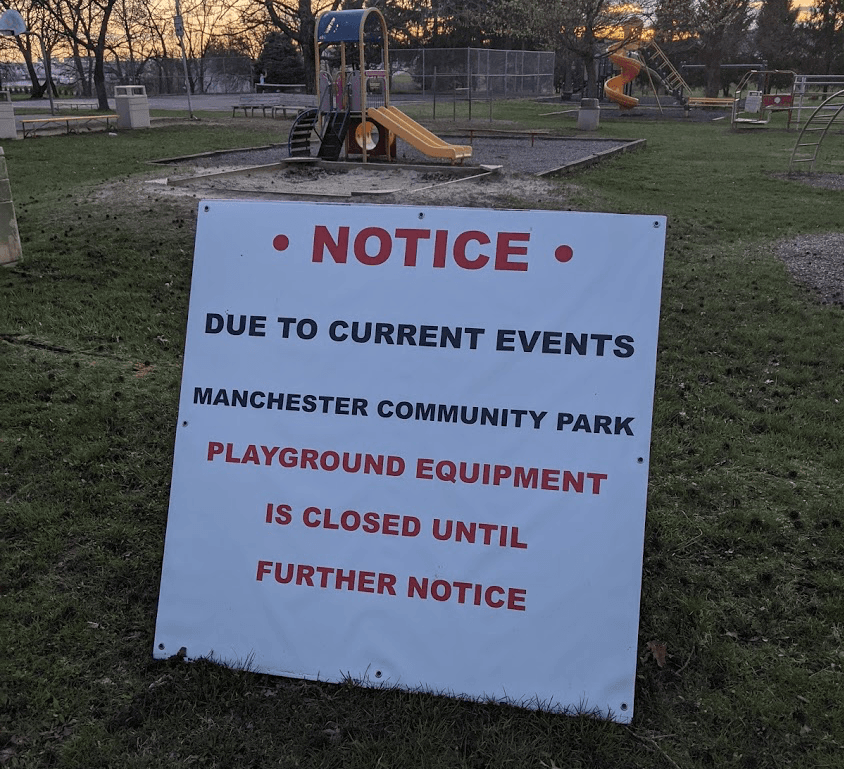 Sign from a local park in my hometown that says the park is closed due to "current events"